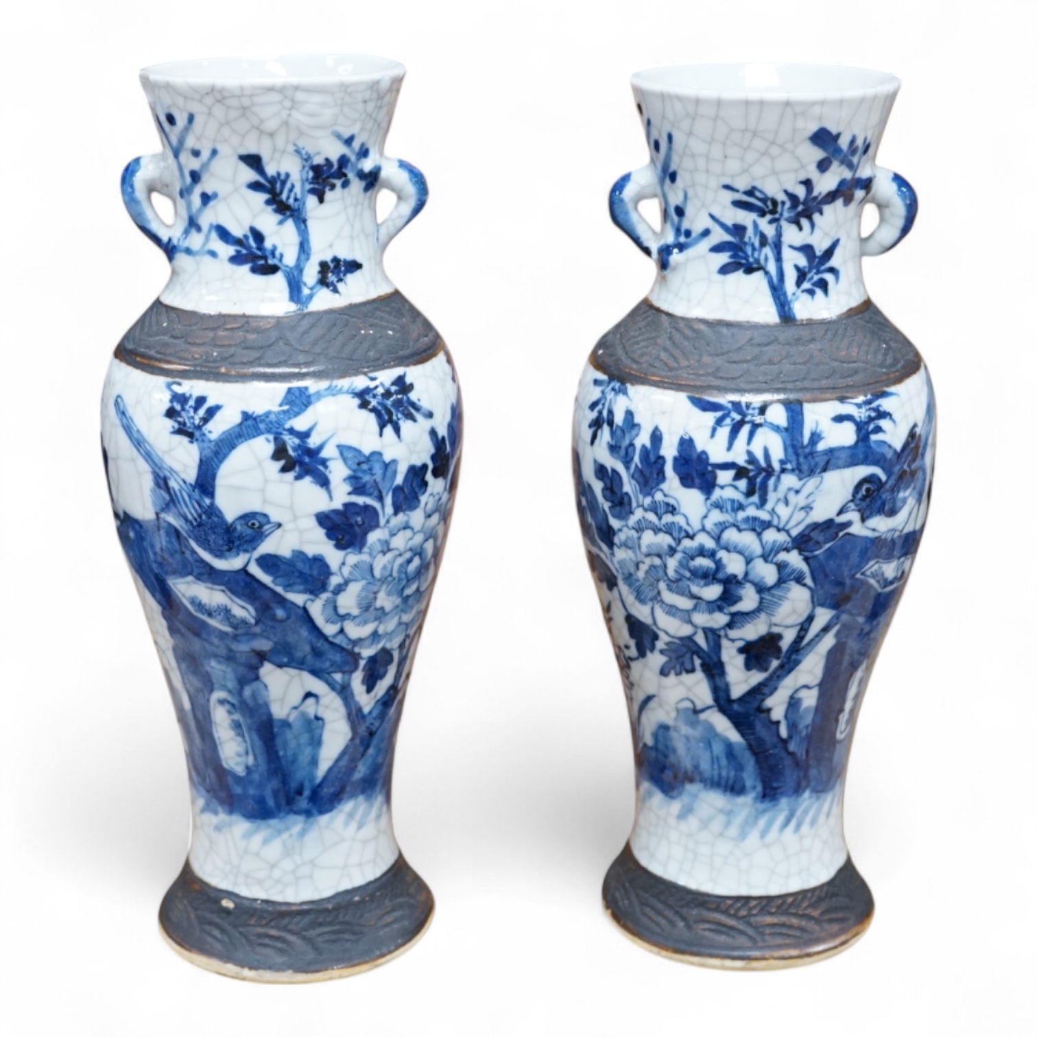 A pair of Chinese blue and white crackleware baluster vases, early 20th century, 26cm high